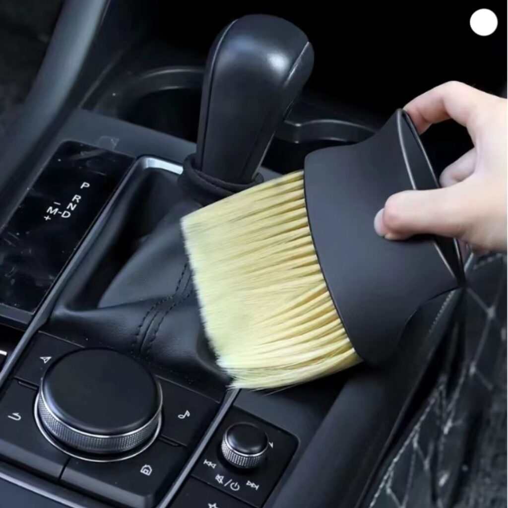 car-interior-sweeping-dust-soft-brush-view